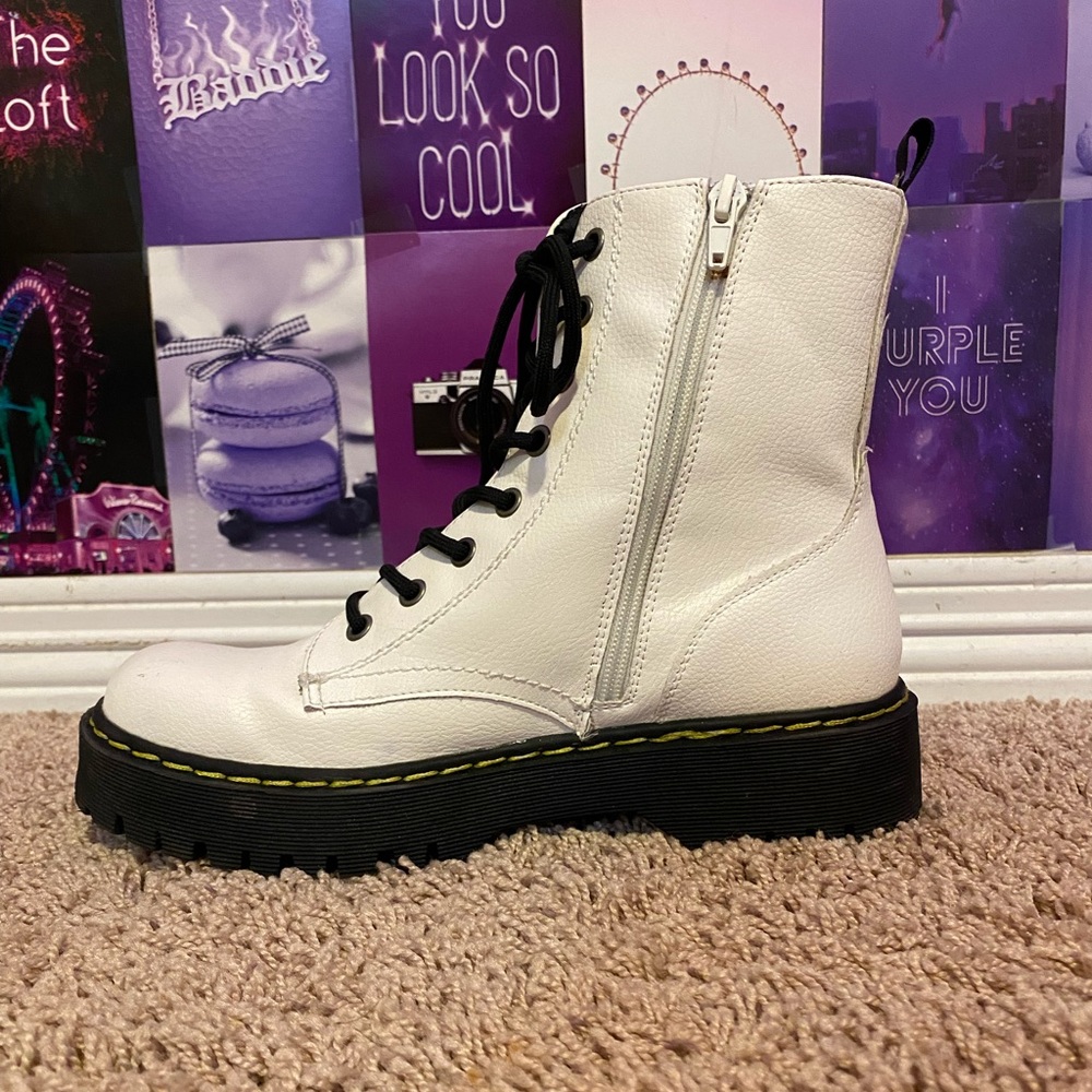 White boots with black laces (not Doc Martin’s)